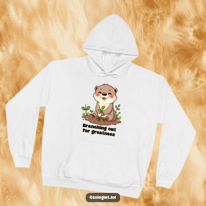 Funny hoodie depicting a cheerful otter character with a wide smile diligently planting a sapling, showcasing its dedication to green initiatives.