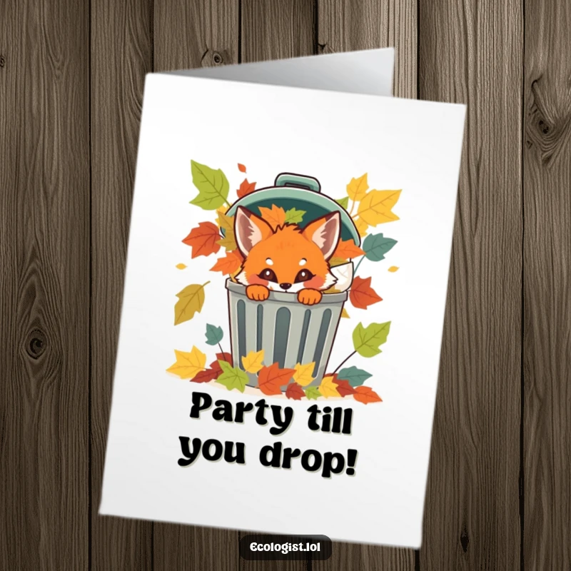 Funny Free Printable Birthday Card: Mischievous fox cub peeking from behind a leaf-filled recycling bin, ready to pounce on the fun.